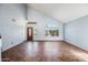 An open concept living room featuring high ceilings and large windows for ample natural light at 1638 N Avoca --, Mesa, AZ 85207