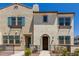 Townhome facade featuring stucco, decorative trim, and a cozy entryway at 1849 E Chelsea Ln # 107, Gilbert, AZ 85295