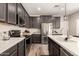 Beautiful kitchen with stainless appliances, quartz countertops, and stylish cabinets at 1849 E Chelsea Ln # 107, Gilbert, AZ 85295