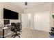 This office has a ceiling fan and is situated near the bedroom and two closets at 1849 E Chelsea Ln # 107, Gilbert, AZ 85295