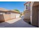 Spacious driveway leading to the home's entrance, with a well-maintained exterior and desert landscaping at 1851 E Ellis St, Phoenix, AZ 85042