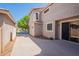 Exterior view of a home featuring desert landscaping and a stucco facade at 1851 E Ellis St, Phoenix, AZ 85042