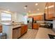Modern kitchen with stainless steel appliances, granite counters, and ample cabinet space at 1851 E Ellis St, Phoenix, AZ 85042