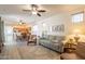 Bright and airy living room with contemporary furnishings and a seamless flow to the kitchen and dining area at 1851 E Ellis St, Phoenix, AZ 85042