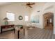 Bright living room with high ceilings, modern decor, stylish flooring, and a playful foosball table at 1851 E Ellis St, Phoenix, AZ 85042