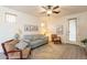 Inviting living room with neutral tones, comfortable seating, ceiling fan, and stylish decor at 1851 E Ellis St, Phoenix, AZ 85042