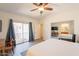 Main bedroom featuring a private balcony, ceiling fan, and closet at 1851 E Ellis St, Phoenix, AZ 85042