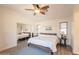 Bright bedroom with a mirror sliding closet, and neutral decor for a relaxing ambiance at 1851 E Ellis St, Phoenix, AZ 85042