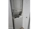 Efficient stacked washer and dryer unit, maximizing space with a nearby storage closet at 200 E Southern Ave # 363, Tempe, AZ 85282