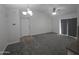 Neutral open floor plan features updated lighting and ceiling fan with convenient access to front entry door at 200 E Southern Ave # 363, Tempe, AZ 85282