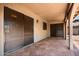 Covered patio featuring stucco pillars and screening and overlooking the backyard at 2005 Leisure World --, Mesa, AZ 85206
