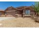 Attractive single-level home with a two-car garage and desert-friendly landscaping at 2025 S 83Rd Dr, Tolleson, AZ 85353
