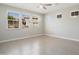 Empty bedroom with neutral colors and large windows providing lots of natural light at 20644 W Mariposa St, Buckeye, AZ 85396