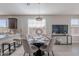 Bright dining area with modern table, chairs, and stylish decor at 20644 W Mariposa St, Buckeye, AZ 85396
