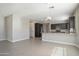 Spacious area with eat-in kitchen featuring stainless steel appliances and granite countertops at 20644 W Mariposa St, Buckeye, AZ 85396