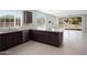 Lovely kitchen features stainless steel appliances, granite countertops and open concept layout at 20644 W Mariposa St, Buckeye, AZ 85396