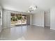Open-concept living area with sliding glass doors leading to outdoor space and neutral interior at 20644 W Mariposa St, Buckeye, AZ 85396