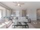 Inviting living room with sliding glass doors to patio and stylish decor at 20644 W Mariposa St, Buckeye, AZ 85396