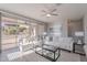 Bright living room with comfortable seating and access to the patio at 20644 W Mariposa St, Buckeye, AZ 85396