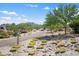 Walking path in the community with scenic mountain views and desert landscaping at 20644 W Mariposa St, Buckeye, AZ 85396