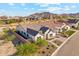 Single Gathering home aerial view with desert landscaping, mountain views, and a well-maintained exterior at 21391 W Mariposa St, Buckeye, AZ 85396