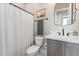 Well-lit bathroom features neutral colors, modern fixtures, and sleek design at 21391 W Mariposa St, Buckeye, AZ 85396