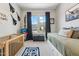 Charming bedroom with crib, single bed, and playful decor at 21391 W Mariposa St, Buckeye, AZ 85396