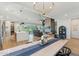 Open-concept living space with modern kitchen, spacious dining area, and comfortable seating, perfect for relaxation and entertaining at 21391 W Mariposa St, Buckeye, AZ 85396