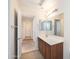 Bathroom with a vanity, two mirrors and tile floors at 2174 W Kristina Ave, San Tan Valley, AZ 85144
