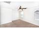 Spacious bedroom with carpeted floors and a window at 2174 W Kristina Ave, San Tan Valley, AZ 85144