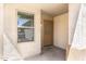 Warm and welcoming front porch with a decorative door and shade from the Arizona sun at 2174 W Kristina Ave, San Tan Valley, AZ 85144
