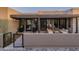 Inviting outdoor patio featuring comfortable seating and lush landscaping with seamless indoor-outdoor flow at 24863 N 103Rd Way, Scottsdale, AZ 85255
