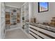 Well-organized pantry with ample shelving, storage, and a countertop for convenience at 24863 N 103Rd Way, Scottsdale, AZ 85255