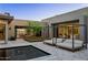 Gorgeous pool area with comfortable loungers, lush landscaping and easy access to indoor living spaces at 24863 N 103Rd Way, Scottsdale, AZ 85255