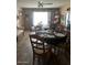 Inviting dining room featuring a classic table setting and lots of light at 2501 E Pebble Beach Dr, Tempe, AZ 85282