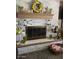 The fireplace is decorated with seasonal decor at 2501 E Pebble Beach Dr, Tempe, AZ 85282