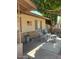 Relax on the covered front porch with comfortable seating and charming decor at 2501 E Pebble Beach Dr, Tempe, AZ 85282