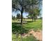 Community park featuring shady trees, picnic tables, and barbeque grills for outdoor gatherings at 2501 E Pebble Beach Dr, Tempe, AZ 85282