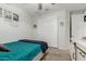 Cozy bedroom with closet, decorated with inspirational art, and featuring neutral carpet flooring at 25915 W Tina Ln, Buckeye, AZ 85396