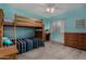 bedroom with bunk bed, desk, dresser, ceiling fan, and natural light at 3065 E Harvard Ave, Gilbert, AZ 85234