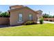 Charming home with colorful landscaping and a well-manicured lawn at 3065 E Harvard Ave, Gilbert, AZ 85234
