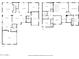 Detailed floor plan showcasing the layout of the first floor, including the kitchen, living areas, and garage at 3065 E Harvard Ave, Gilbert, AZ 85234
