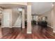 Open-concept living area featuring hardwood floors and an elegant staircase at 3065 E Harvard Ave, Gilbert, AZ 85234