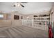 Loft space with a railing and built-in shelving at 3065 E Harvard Ave, Gilbert, AZ 85234