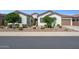 Charming single-story home with desert landscaping, a tile roof, and an attached garage at 31320 N 54Th Pl, Cave Creek, AZ 85331