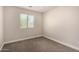 Bedroom with neutral walls, plush carpet and natural light at 3449 E Sheffield Rd, Gilbert, AZ 85296