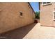 Side yard featuring stucco wall and gravel ground cover at 3449 E Sheffield Rd, Gilbert, AZ 85296
