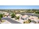 A picturesque neighborhood showcasing well-kept houses and mature trees at 3668 E Derringer Way, Gilbert, AZ 85297
