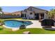 View of the backyard pool and patio areas at 3668 E Derringer Way, Gilbert, AZ 85297