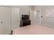 Bedroom view features closet, mounted television, and easy access to the hallway at 3668 E Derringer Way, Gilbert, AZ 85297